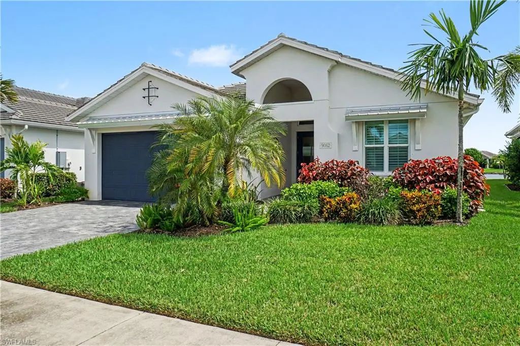 Front exterior of 9062 Montserrat Drive, a Toll Brothers home in Azure at Hacienda Lakes, Naples, Florida