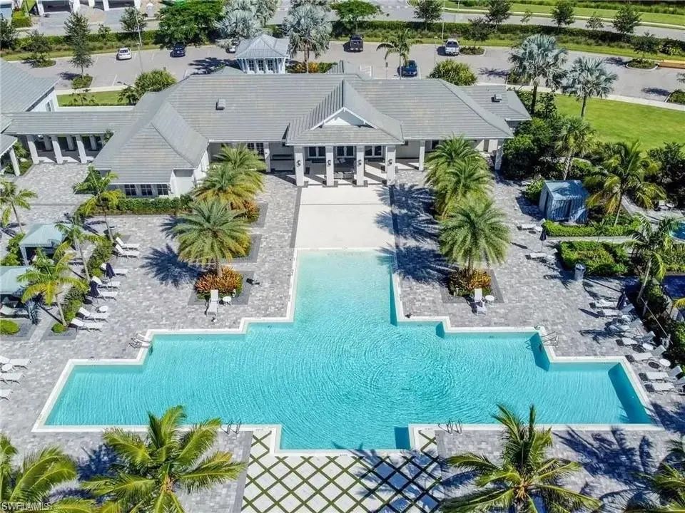Aerial view of the Azure at Hacienda Lakes clubhouse and resort-style community pool in Naples, Florida